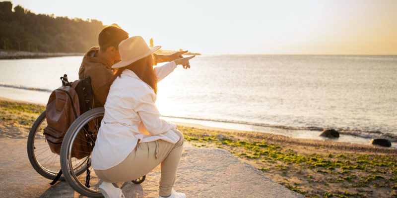 full-shot-couple-looking-sea